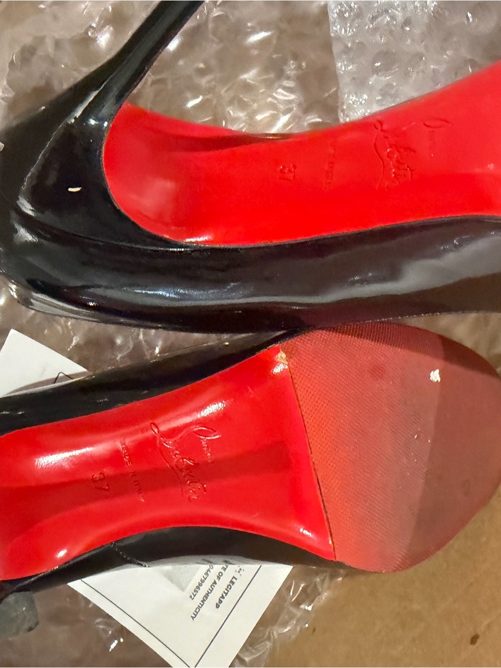 Christian Louboutin Black Patent Pumps with Red Soles